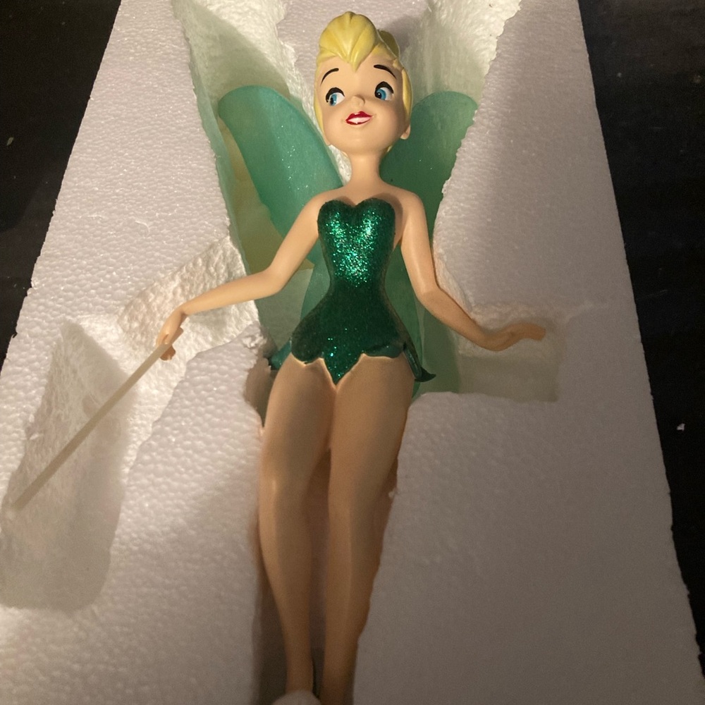 Disney Tinkerbell tree topper in original packaging. About 11.5 inches tall.